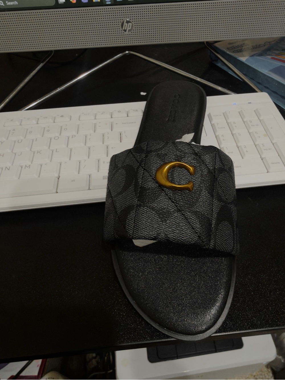Coach Black Slide sandals with Gold “C”